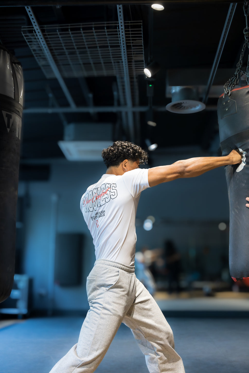 Progress Over Comfort Performance Tee — White
